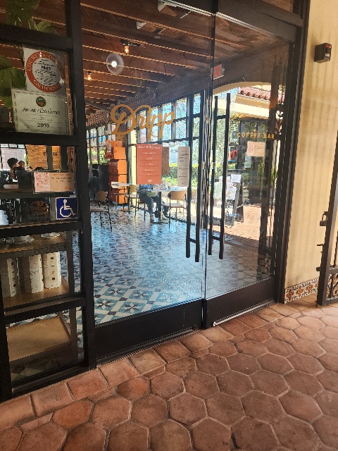 Double glass door entrance to Dripp in Fullerton